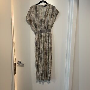 Snake print jumpsuit with keyhole back!
